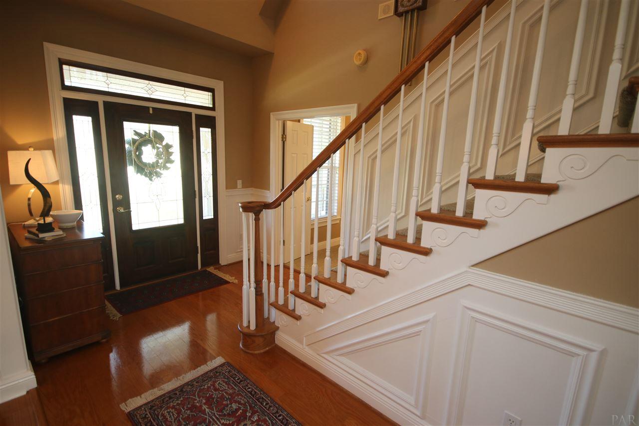 5559 Allie Rae Street Milton, FL 32570 - Photo 12 of 50 door & picture frame molding along the staircase.