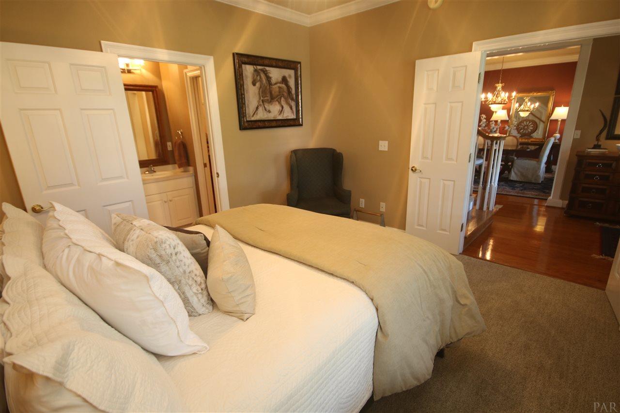 5559 Allie Rae Street Milton, FL 32570 - Photo 26 of 50 to the left. Bathroom has a walk-in closet.