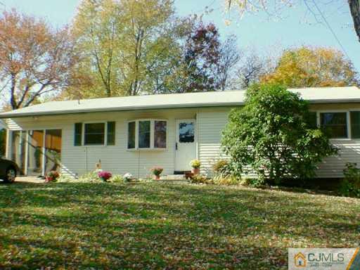 19 Villanova Road Old Bridge, NJ 08859 - Photo 2 of 2 a front view of a house with a yard