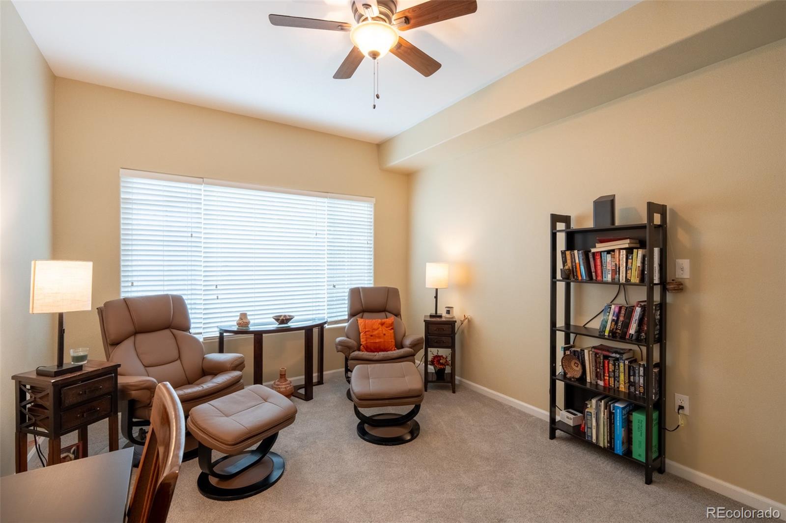 8495 Pebble Creek Way, Unit 102 Highlands Ranch, CO 80126 - Photo 20 of 22 a room with furniture