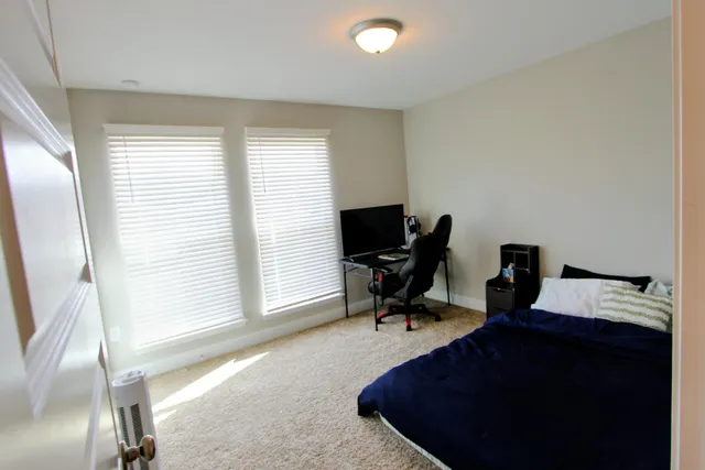 a workspace with furniture and a window