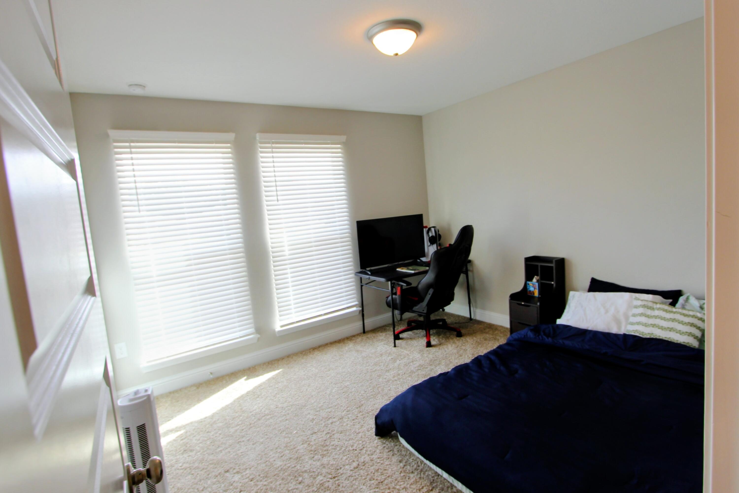 5438 Lee Farm Boulevard Crestview, FL 32536 - Photo 30 of 50 a workspace with furniture and a window