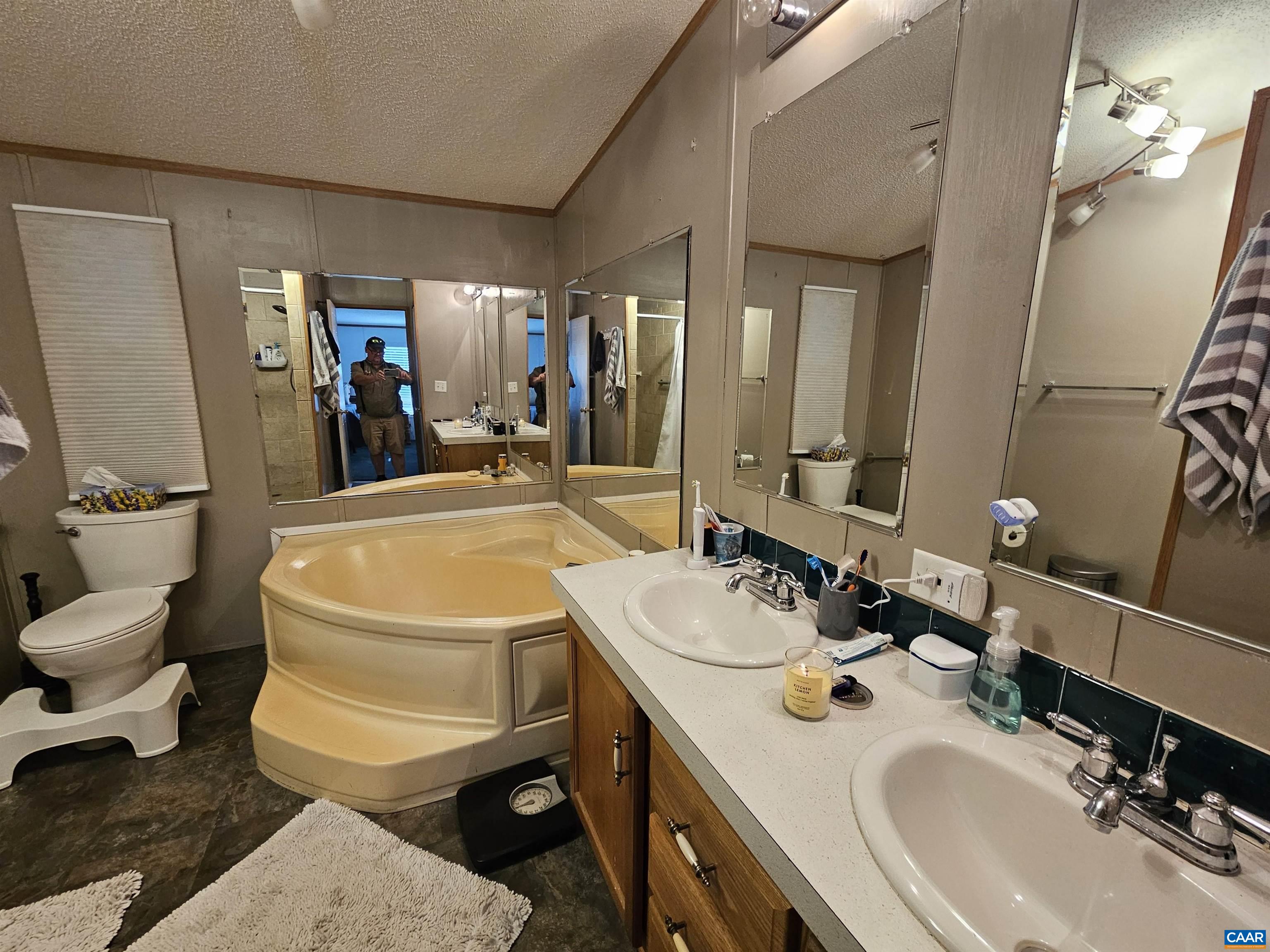 981 Scotts Bottom Road Dillwyn, VA 23936 - Photo 18 of 62 a bathroom with a sink double vanity and toilet