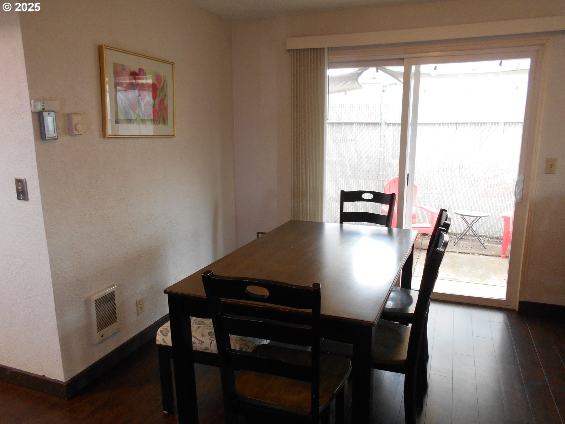 4565 Souza Street Eugene, OR 97402 - Photo 17 of 43 a view of a dining room with furniture and wooden floor