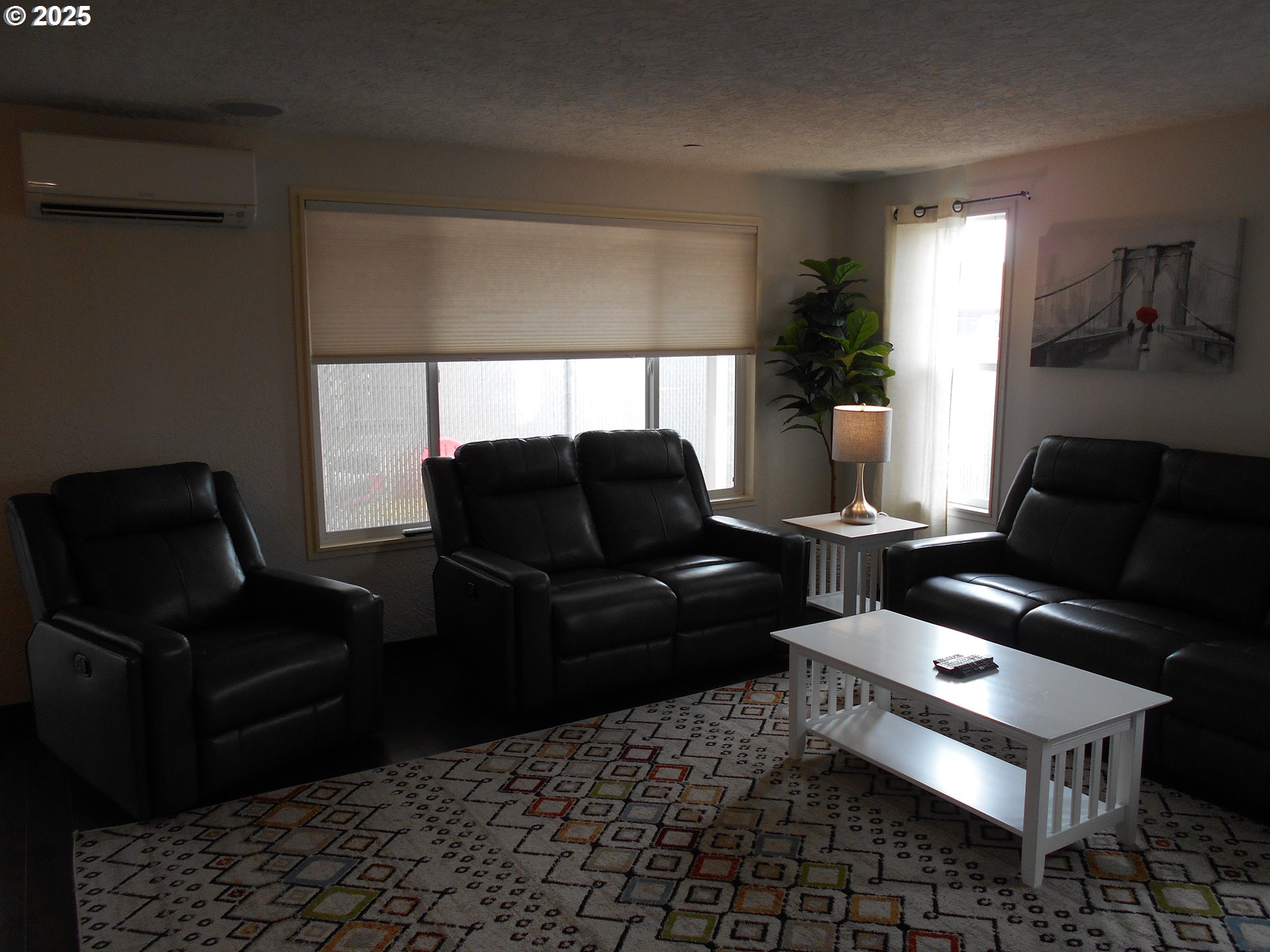 4565 Souza Street Eugene, OR 97402 - Photo 21 of 43 a living room with furniture and a rug