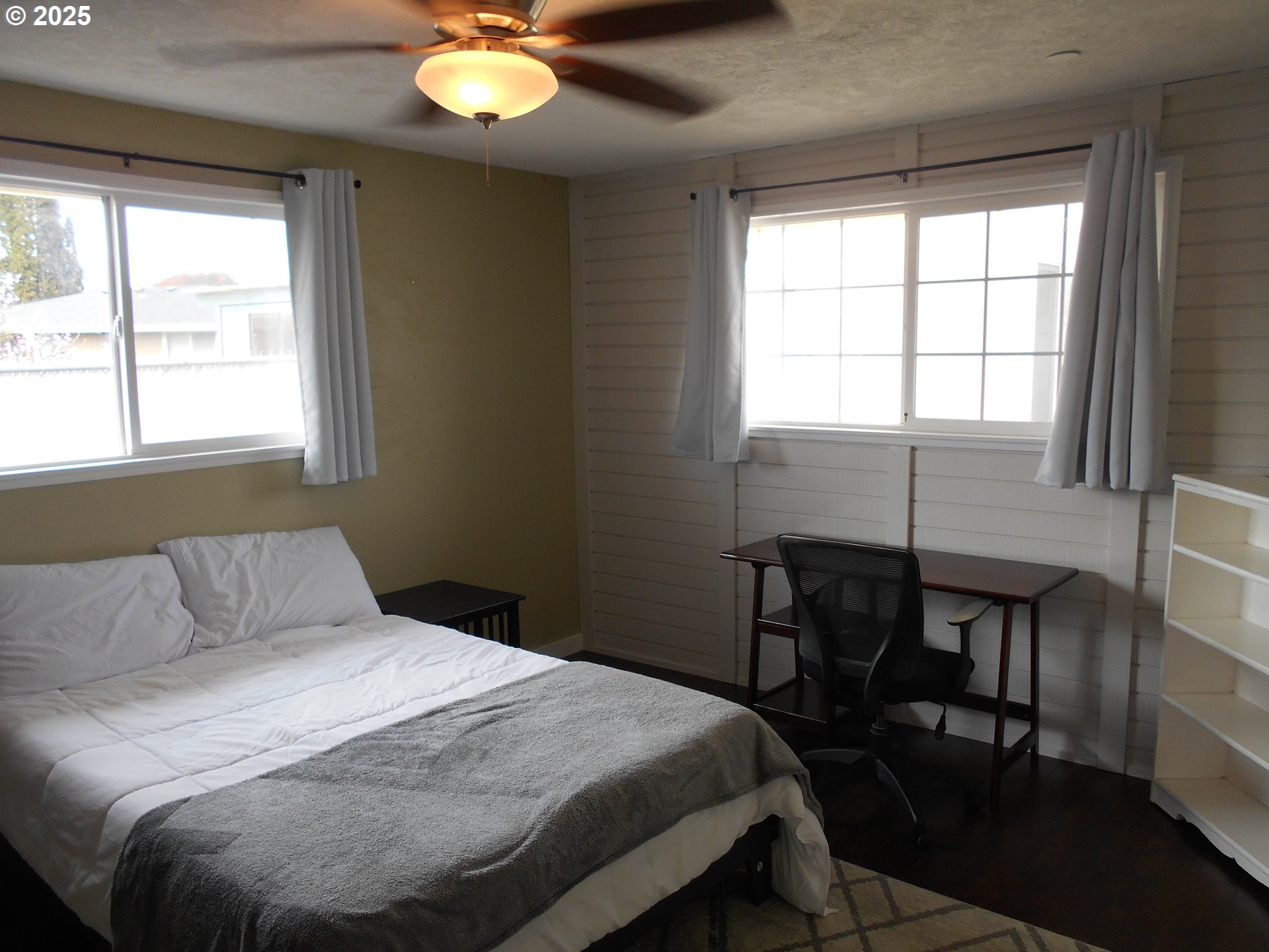 4565 Souza Street Eugene, OR 97402 - Photo 26 of 43 a bedroom with a bed and a window