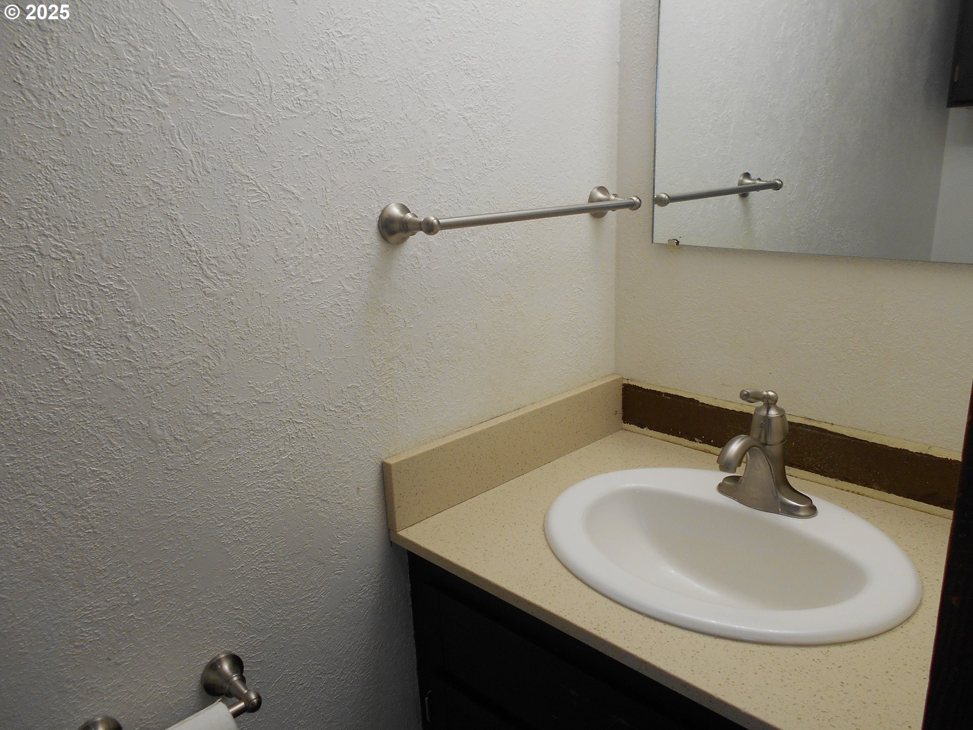 4565 Souza Street Eugene, OR 97402 - Photo 35 of 43 a bathroom with a sink and a mirror