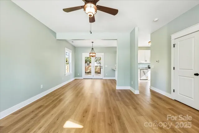a view of an empty room and window
