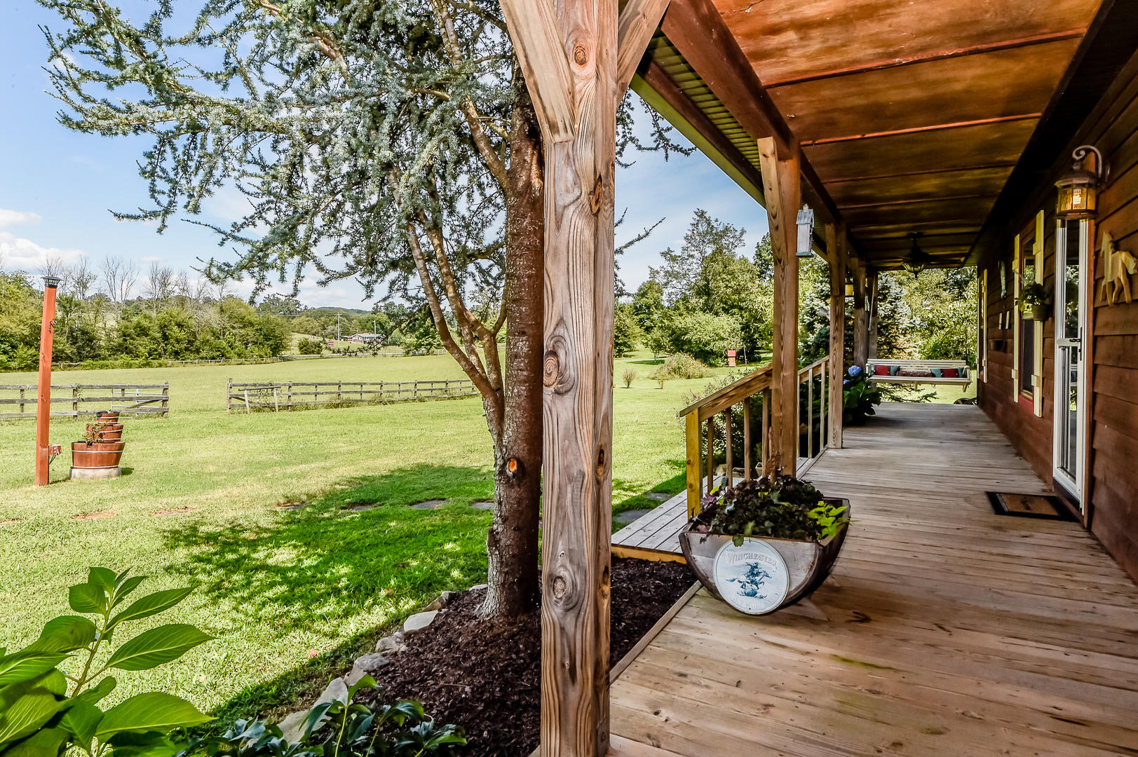 6325 Morganton Road Greenback, TN 37742 - Photo 4 of 40 Front porch to pasture