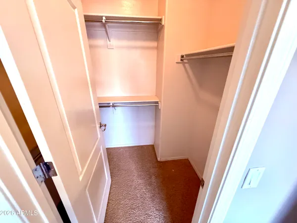 a bathroom with a sink a mirror and a shower