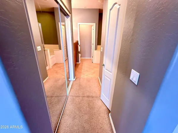 a view of an empty walk in closet