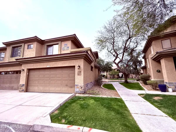 a view of a backyard with plants and a park