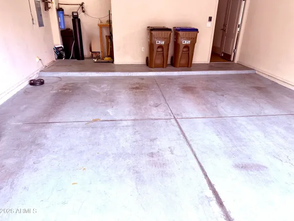 a sign on a pole on a street