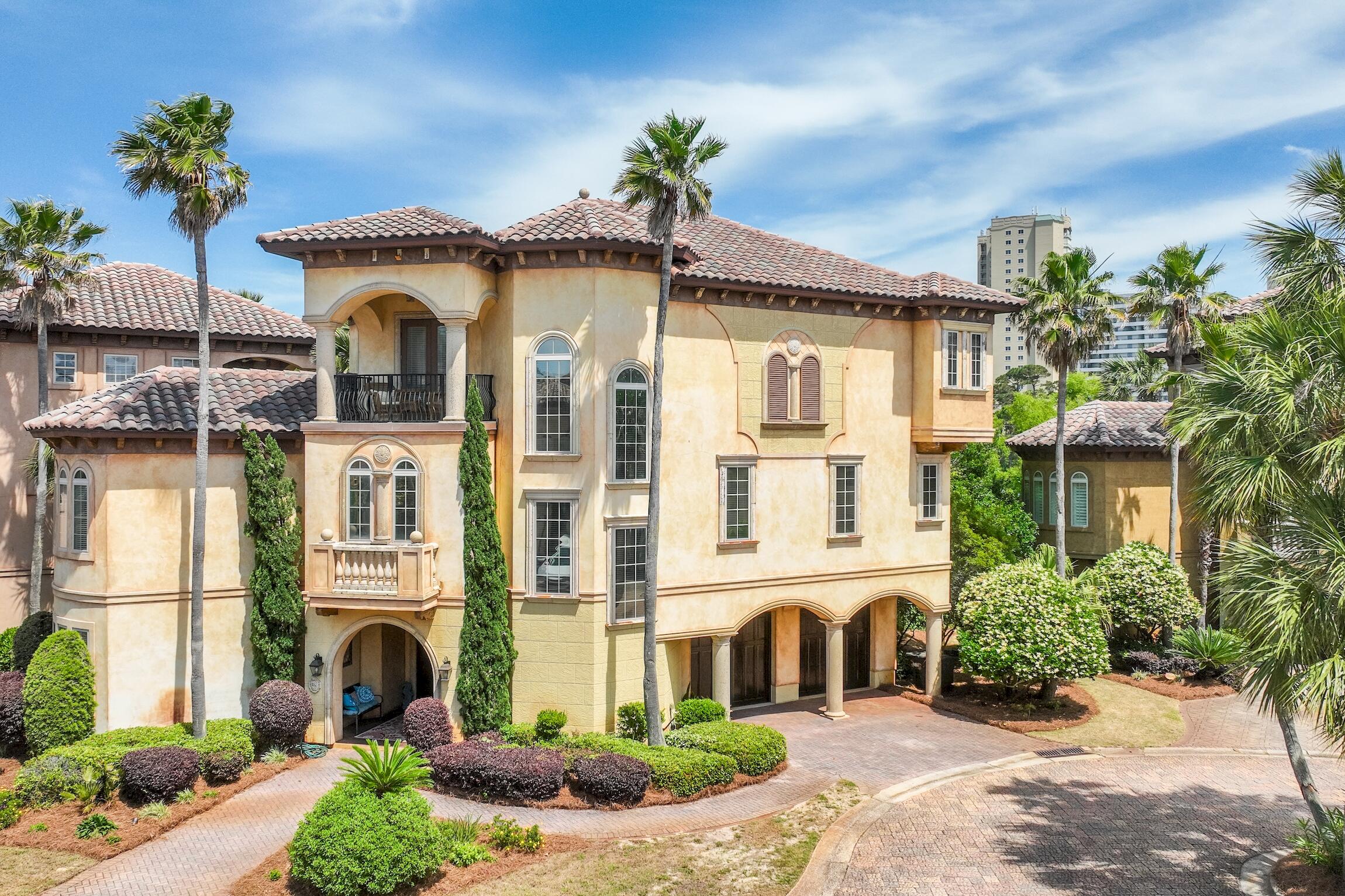 215 Rue St Tropez Miramar Beach, FL 32550 - Photo 2 of 46 a front view of a house with a porch