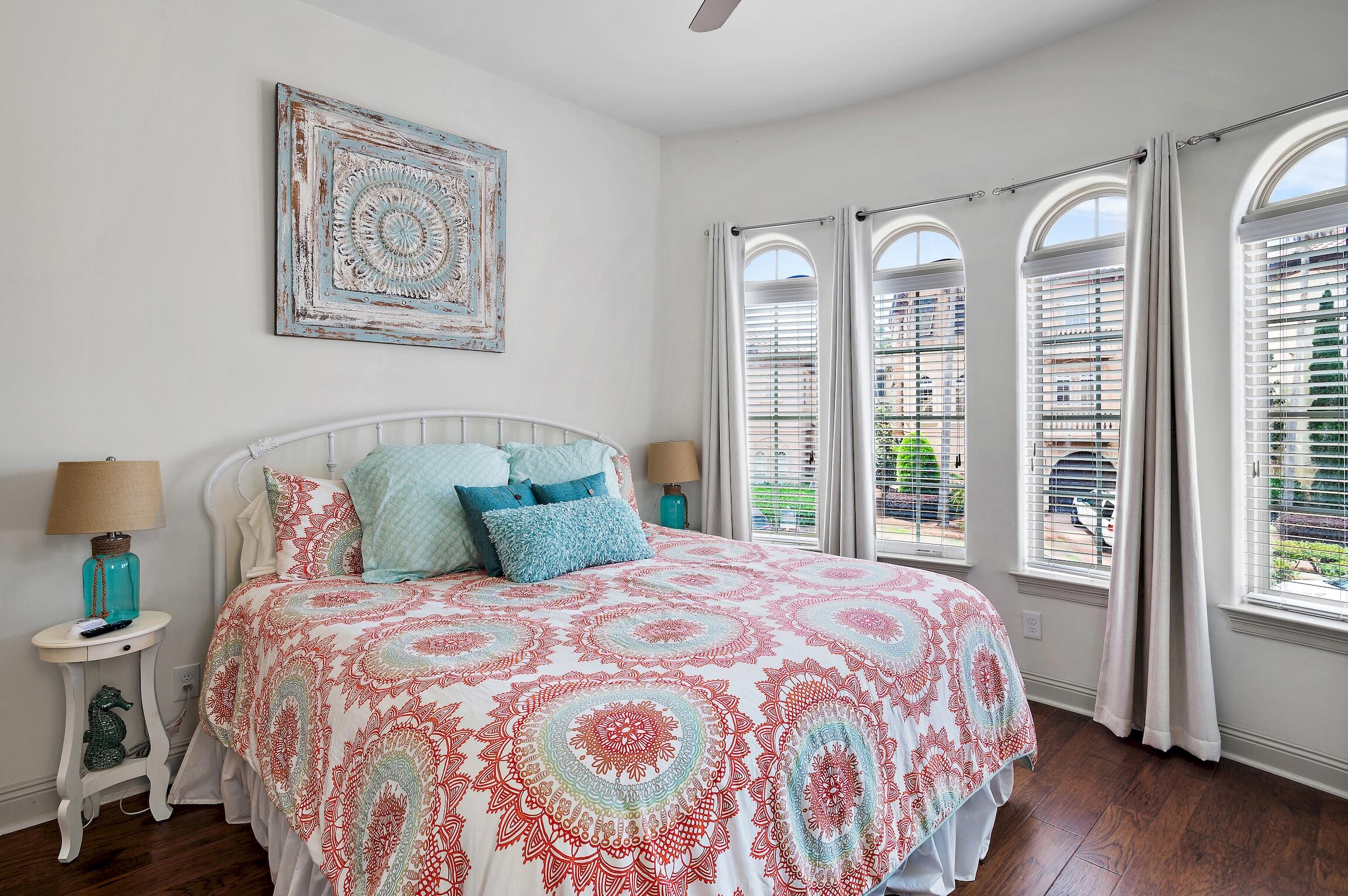 215 Rue St Tropez Miramar Beach, FL 32550 - Photo 25 of 46 a large bed sitting in a bedroom next to a large window