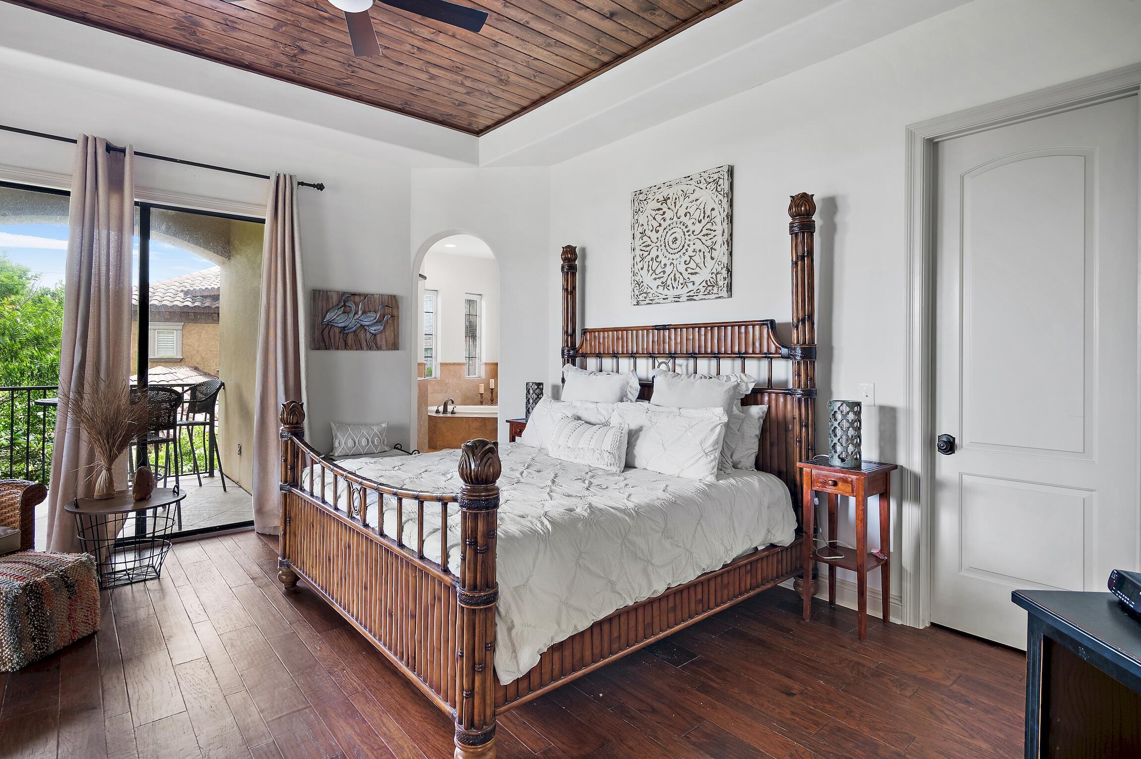 215 Rue St Tropez Miramar Beach, FL 32550 - Photo 32 of 46 a bed sitting in a bedroom next to a window