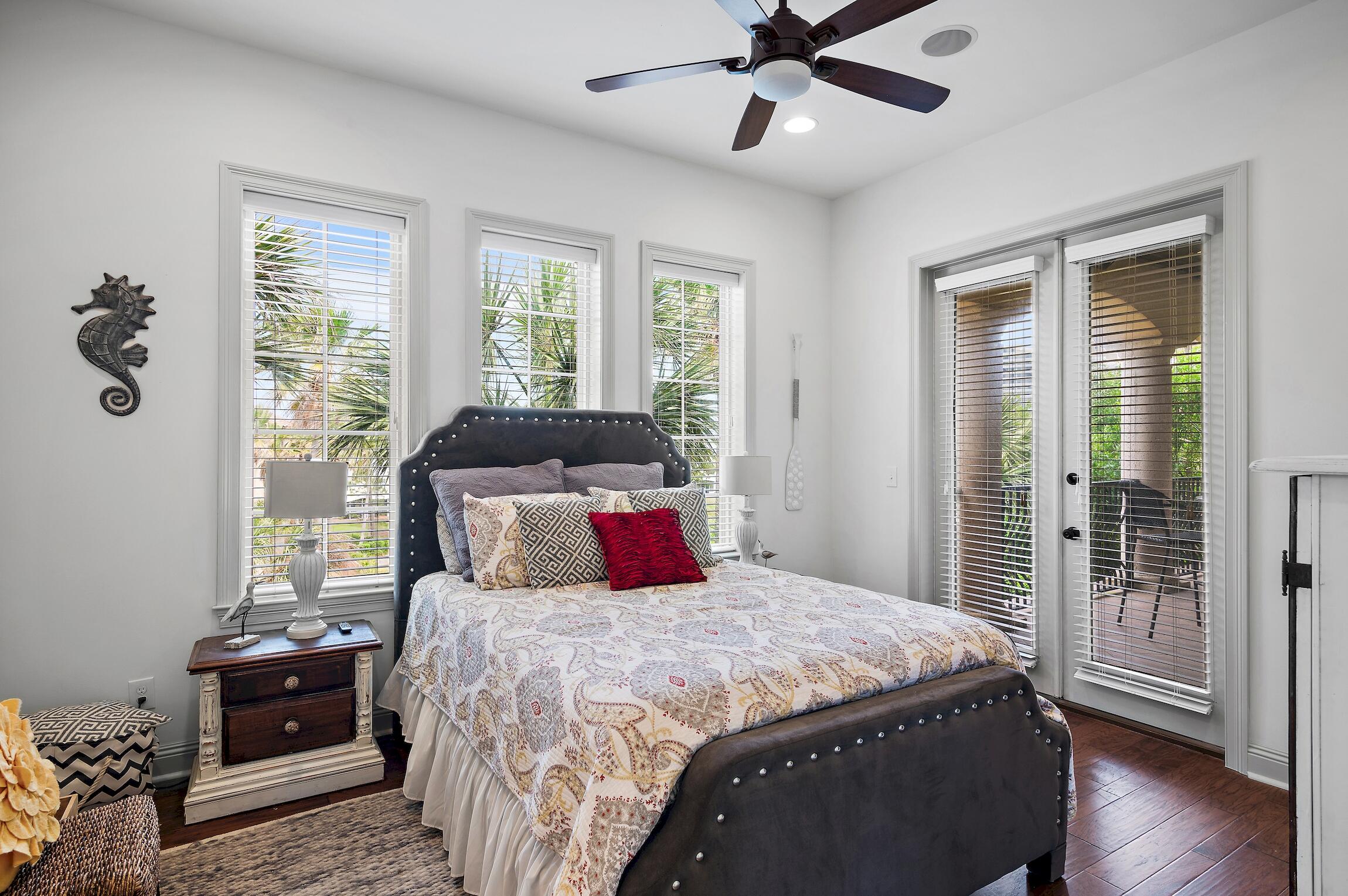 215 Rue St Tropez Miramar Beach, FL 32550 - Photo 40 of 46 a bedroom with a large bed and a window