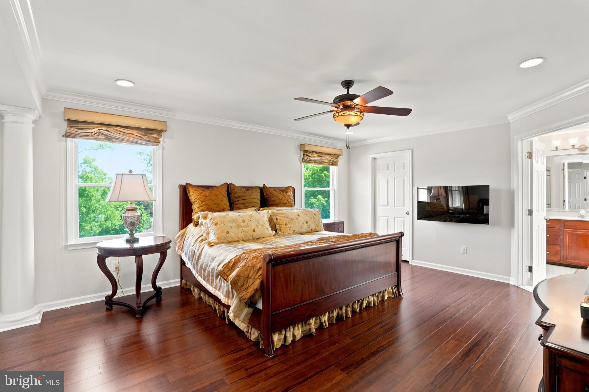 2303 Redtail Road Norristown, PA 19403 - Photo 23 of 53 a bedroom with a bed a flat screen tv and a large window