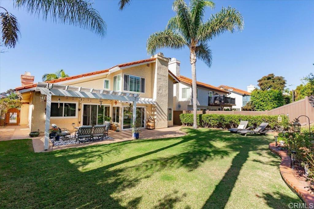 13411 Appalachian Way San Diego, CA 92129 - Photo 12 of 12 a front view of a house with garden