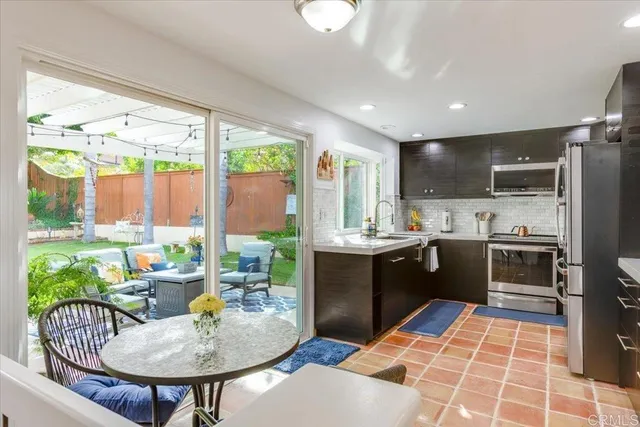 a kitchen with a sink and counter top space