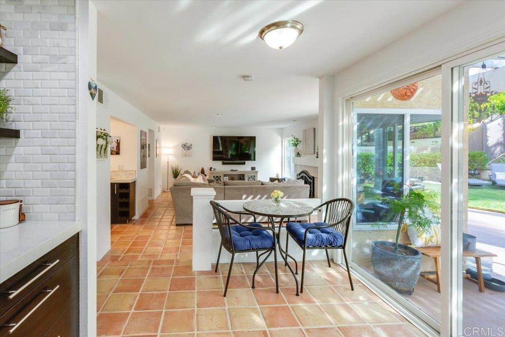13411 Appalachian Way San Diego, CA 92129 - Photo 6 of 12 a view of a dining room with furniture window and outside view