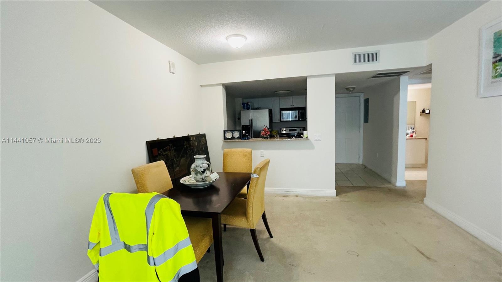 West Flagler Miami, FL 33125 - Photo 17 of 28 a living room with furniture and a table