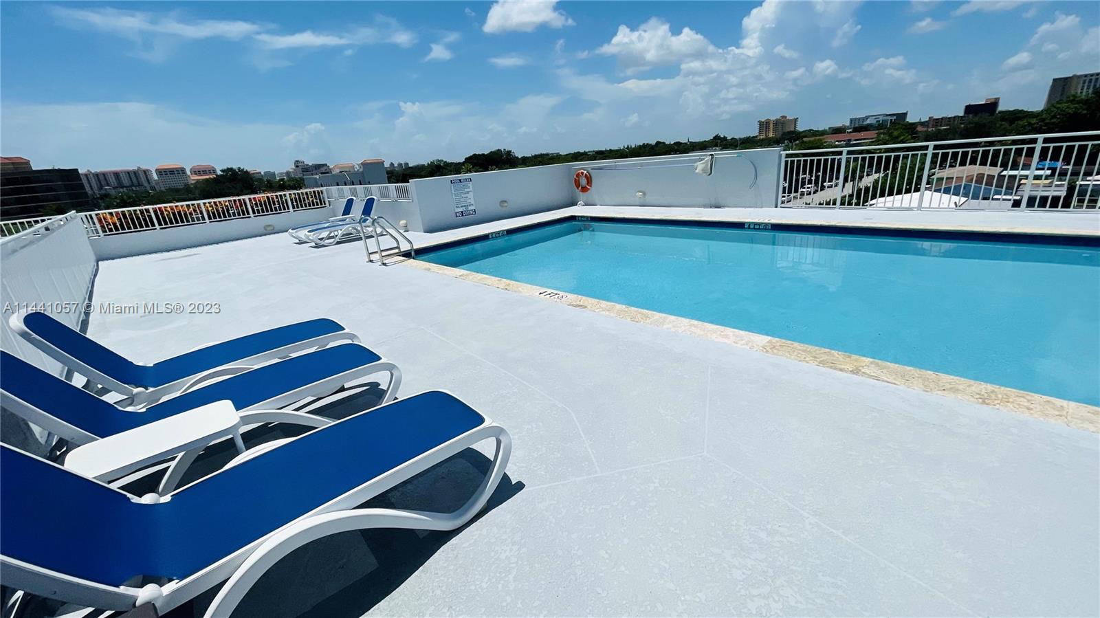 West Flagler Miami, FL 33125 - Photo 26 of 28 a view of a chairs and table on the terrace