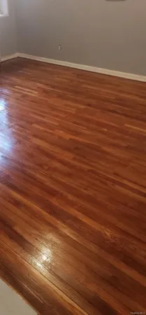 a view of a kitchen with wooden floor