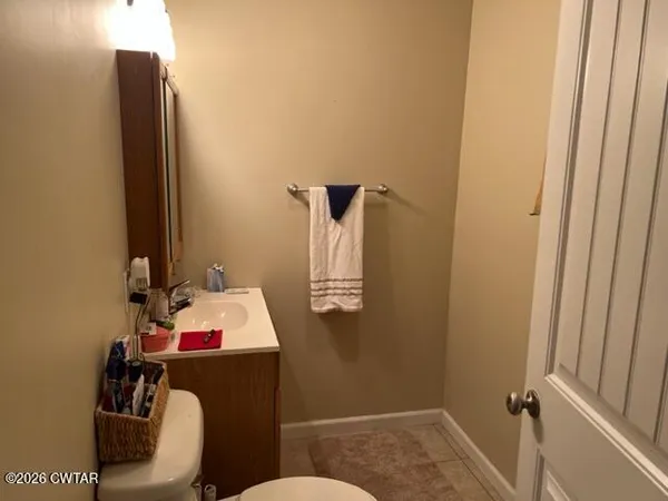 a bathroom with a sink and toilet