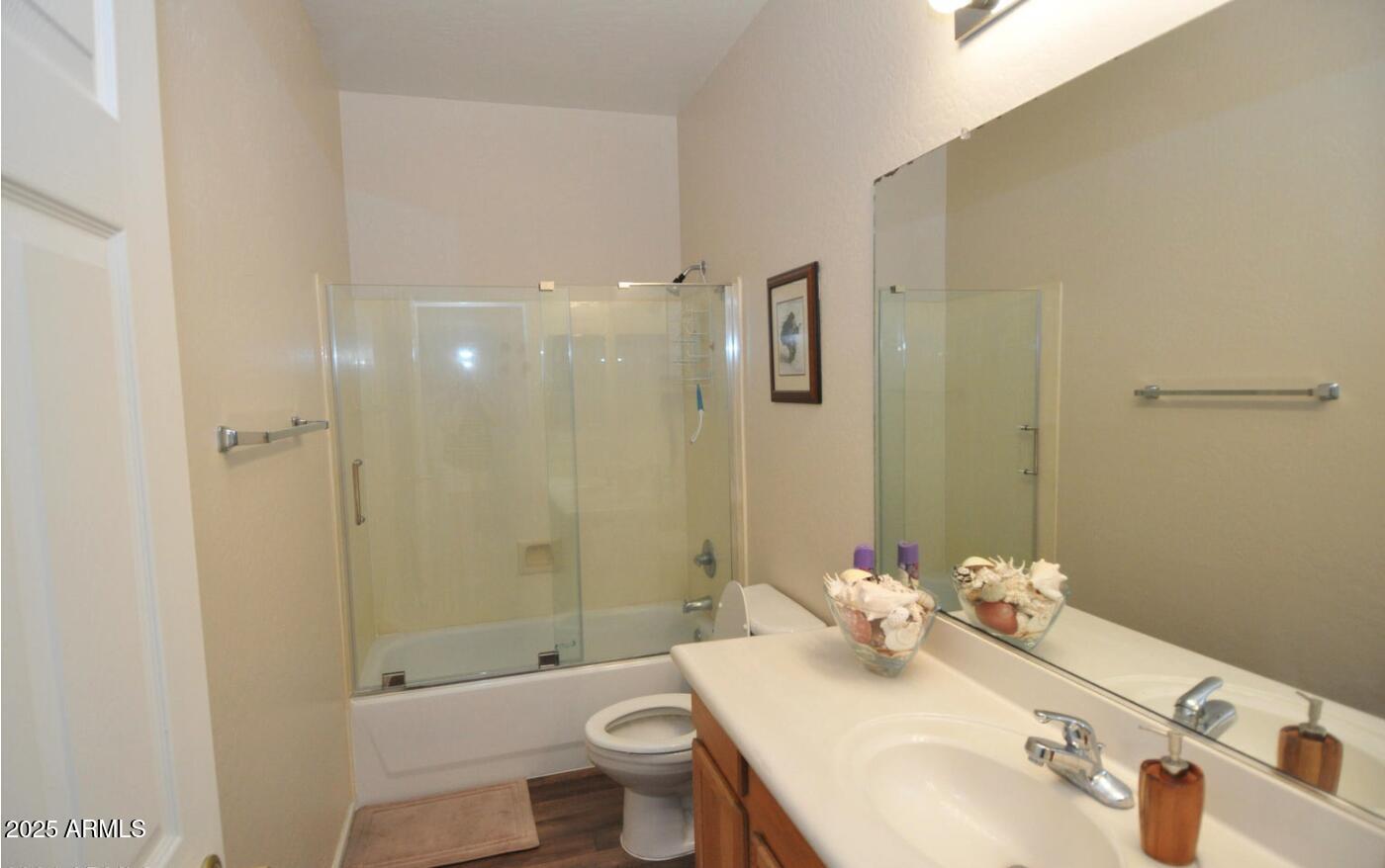 3530 East Los Altos Road Gilbert, AZ 85297 - Photo 12 of 20 a bathroom with a sink toilet and shower