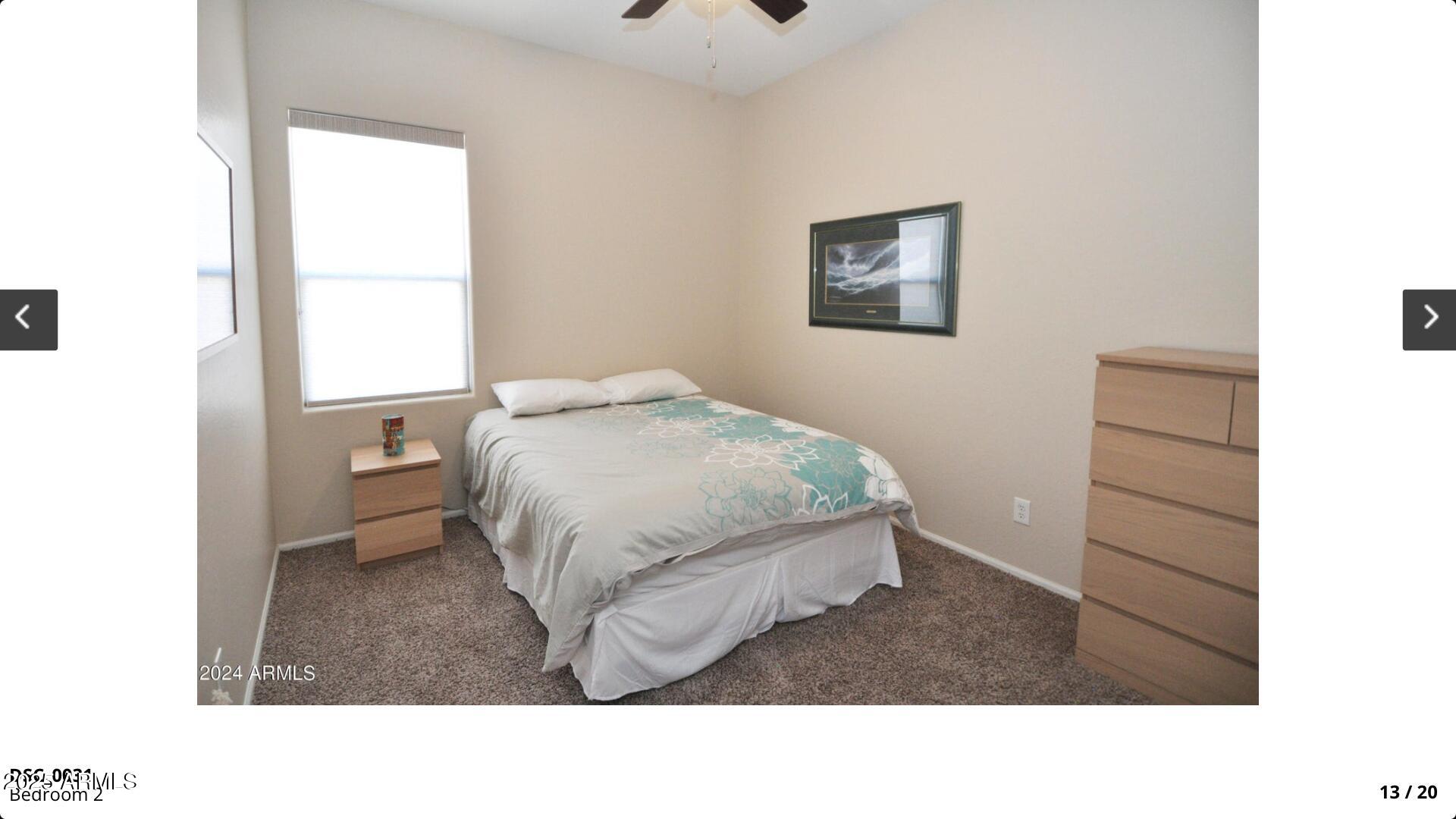 3530 East Los Altos Road Gilbert, AZ 85297 - Photo 13 of 20 a living room with a bed and a window