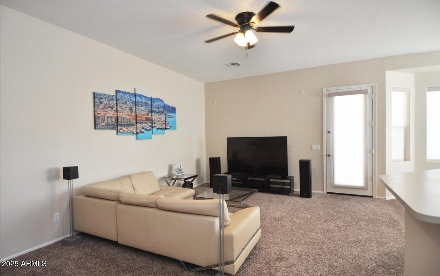 3530 East Los Altos Road Gilbert, AZ 85297 - Photo 8 of 20 a living room with furniture and a flat screen tv