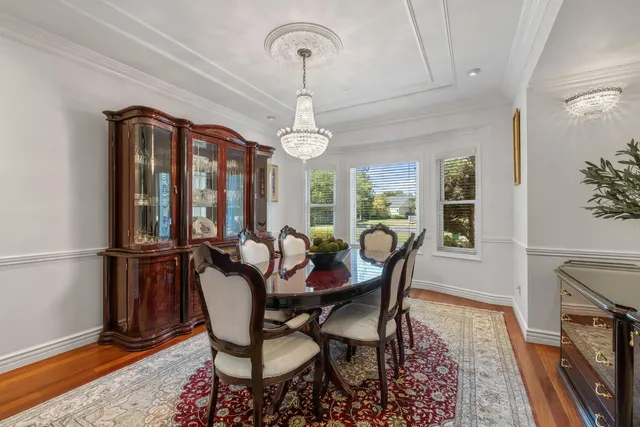 a kitchen with stainless steel appliances granite countertop a stove and a sink