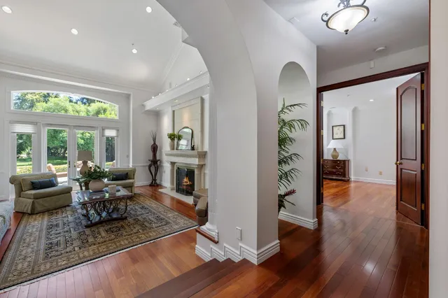a kitchen with stainless steel appliances granite countertop a stove and a sink