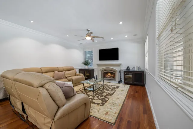 a bathroom with a granite countertop sink and a large mirror
