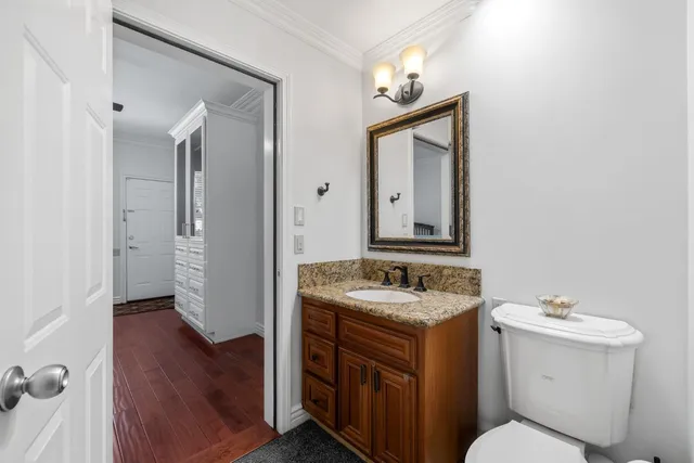 a view of a porch with chairs and backyard
