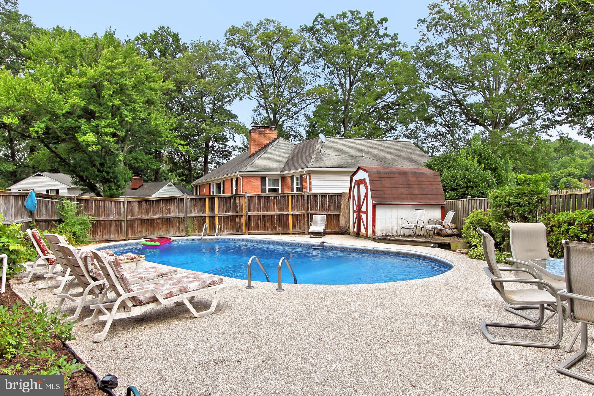 7845 Doane Court Springfield, VA 22152 - Photo 34 of 43 In-ground pool with new pump