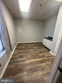 21614 Great Mills Road, Unit 104 Lexington Park, MD 20653 - Photo 11 of 17 a view of an empty room with wooden floor and stairs