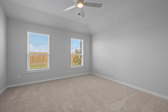 a bathroom with a double vanity sink and mirror