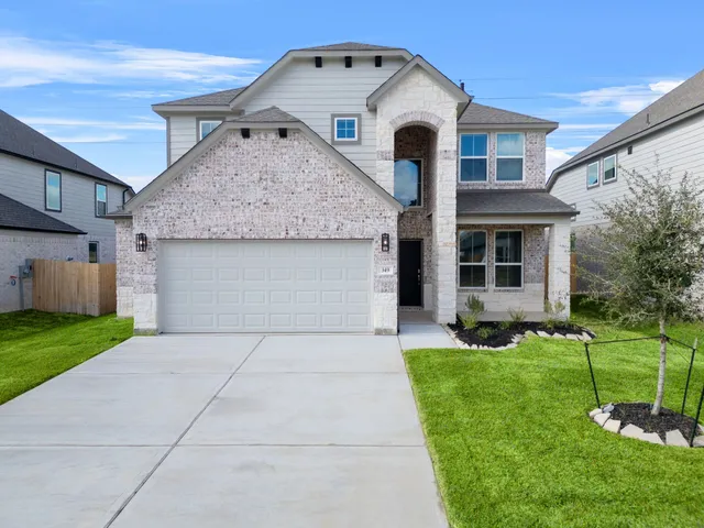 a view of swimming pool with a yard