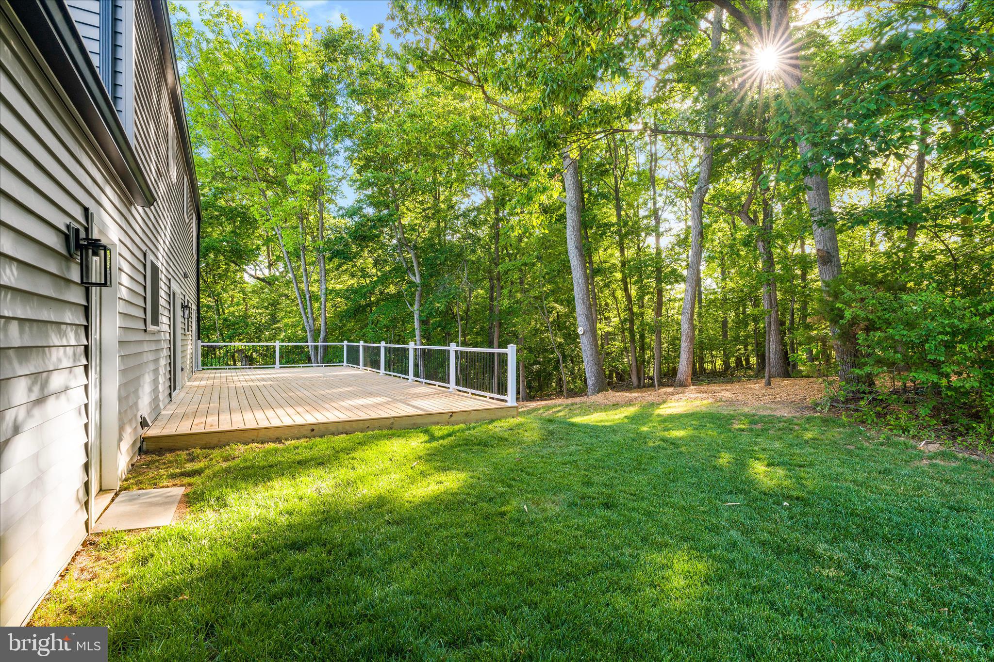 3908 Shakespeare Way Monrovia, MD 21770 - Photo 37 of 59 a view of a backyard with swimming pool