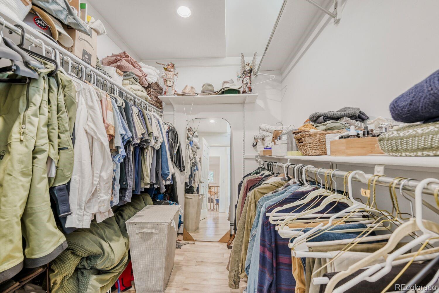 924 Kelly Road West Boulder, CO 80302 - Photo 25 of 44 a view of walk in closet with clothes