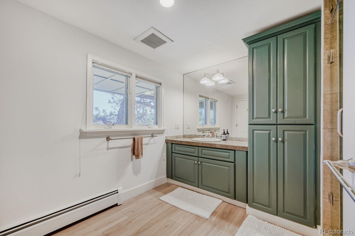 924 Kelly Road West Boulder, CO 80302 - Photo 36 of 44 a kitchen with stainless steel appliances granite countertop a refrigerator and a sink