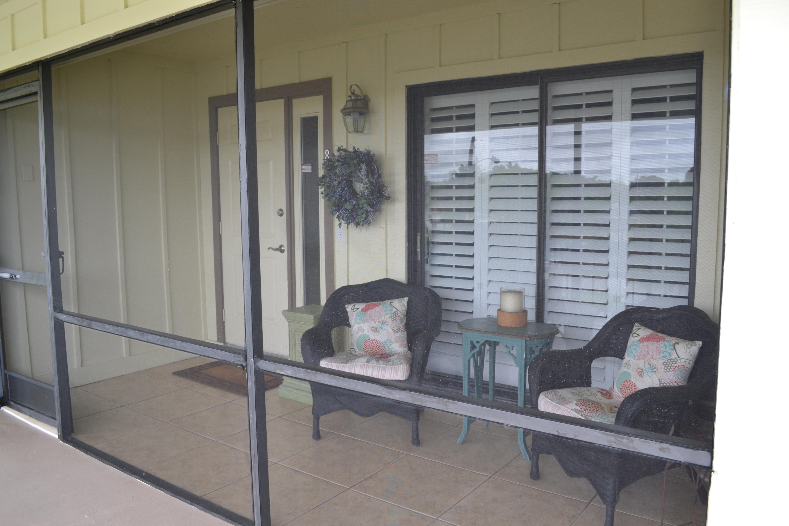 201 Southwest 1st Street, Unit 8 Boca Raton, FL 33432 - Photo 1 of 27 a room with windows