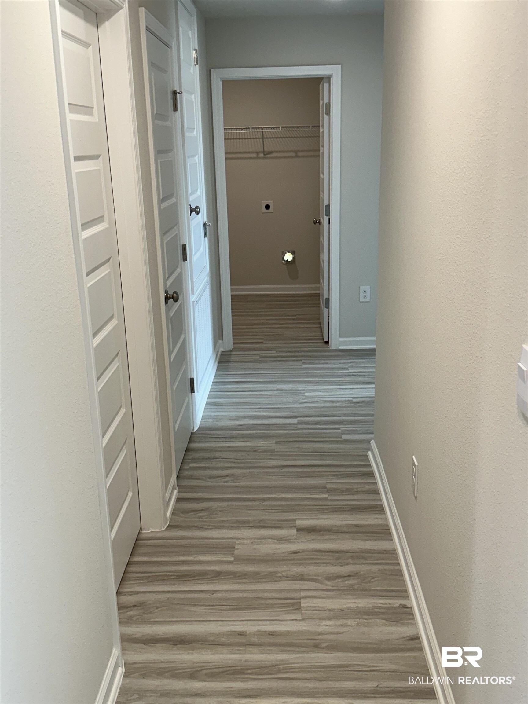 8850 Sea Star Circle Foley, AL 36535 - Photo 25 of 29 Corridor with wood-type flooring