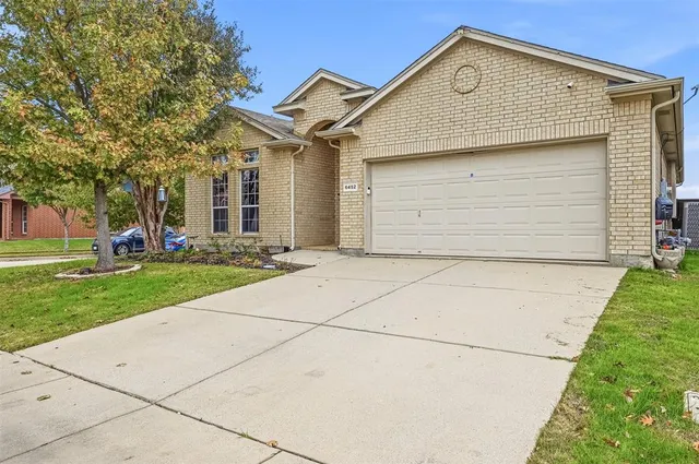 front view of house with a yard