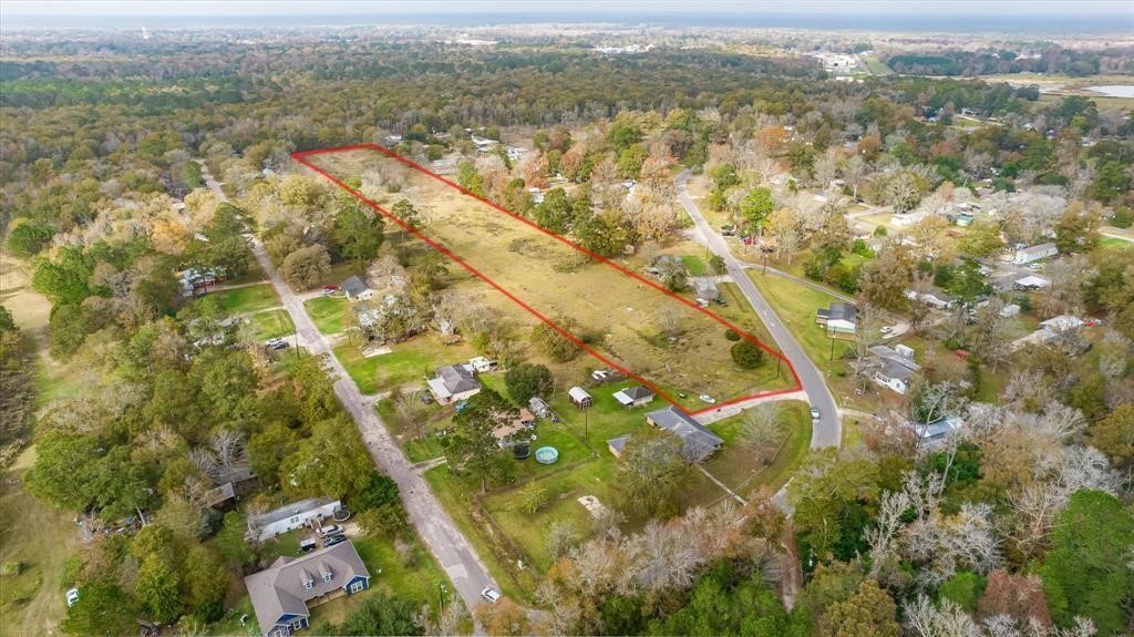 0 Minglewood Road Liberty, TX 77575 - Photo 2 of 6 an aerial view of residential houses with outdoor space
