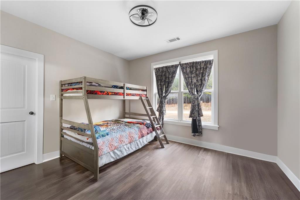 610 Cedar Creek Road Cartersville, GA 30121 - Photo 51 of 75 a bedroom with a bed and a window