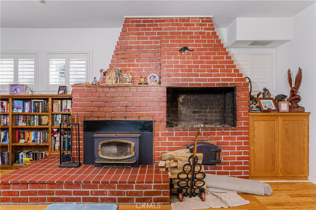 150 Pinal Avenue Santa Maria, CA 93455 - Photo 12 of 36 a view of living room with furniture and a fireplace