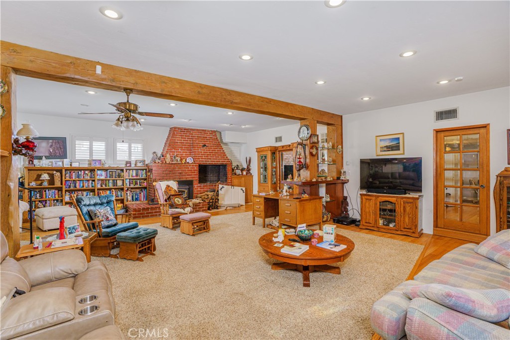 150 Pinal Avenue Santa Maria, CA 93455 - Photo 14 of 36 a living room with furniture and a flat screen tv